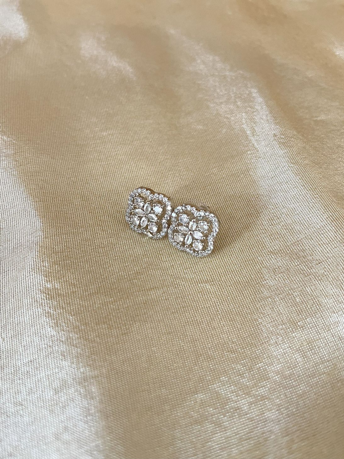 Shop Vedehi Stud Earrings Small In AD online in India. Shop AD earrings, bridal AD jewelry, AD necklace sets for weddings, engagements and parties. -side