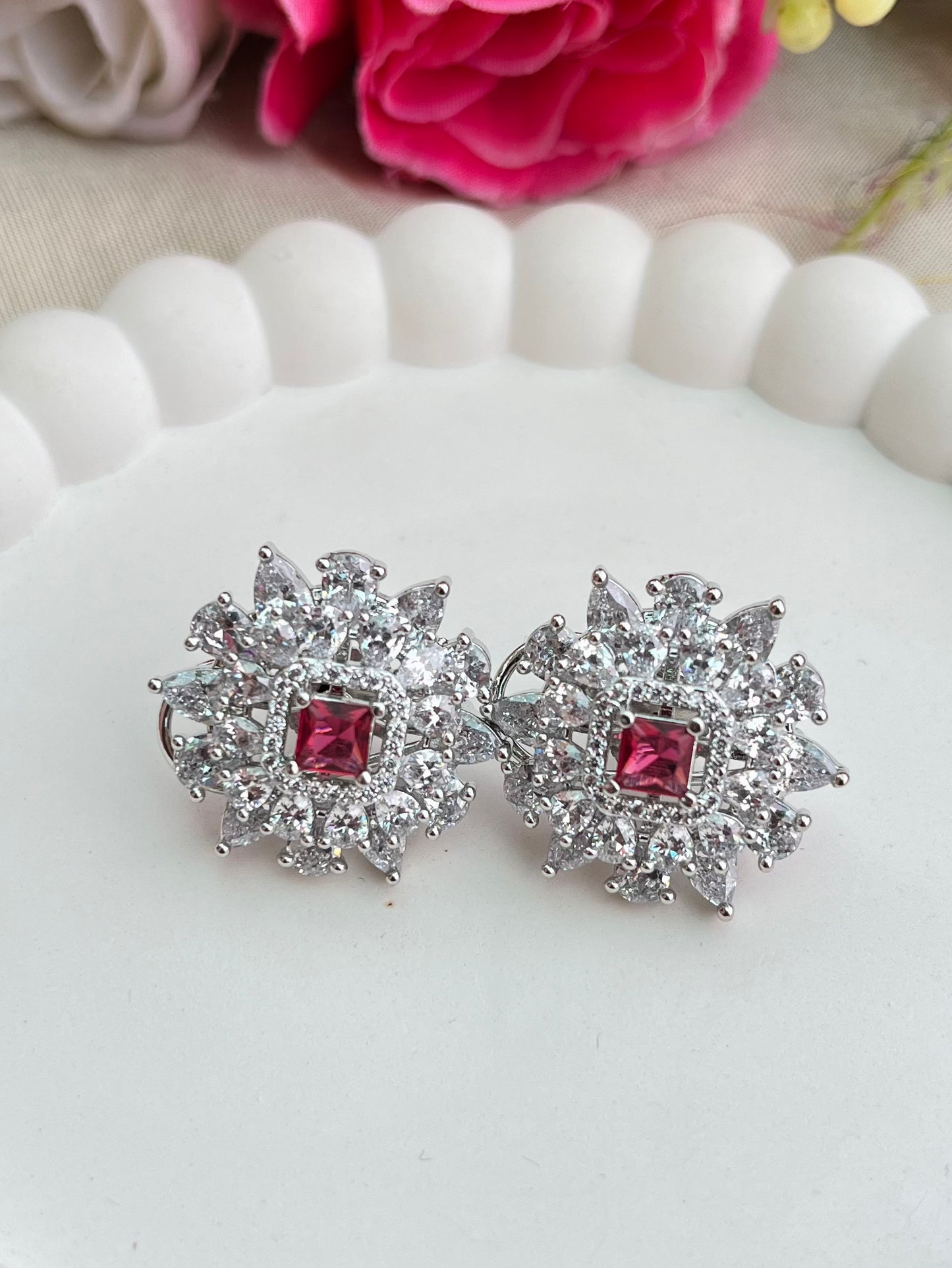 Shop CZ Stones Stud Earrings In Green Stone online in India. Shop AD earrings, bridal AD jewelry, AD necklace sets for weddings, engagements and parties. -first