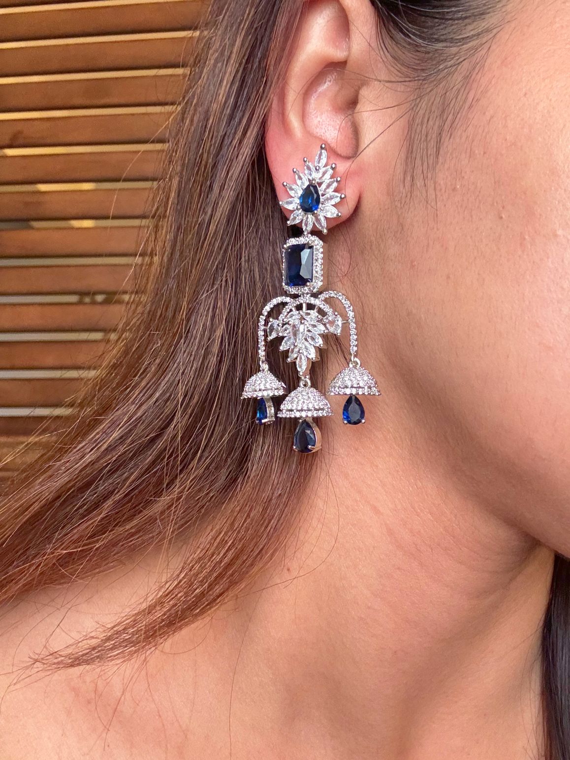 Shop Crystal Glow Heavy Chandelier AD Earrings In Blue Stone online in India. Shop from an exclusive range of CZ jewellery, gold plated, silver, mehendi polish earrings. -first