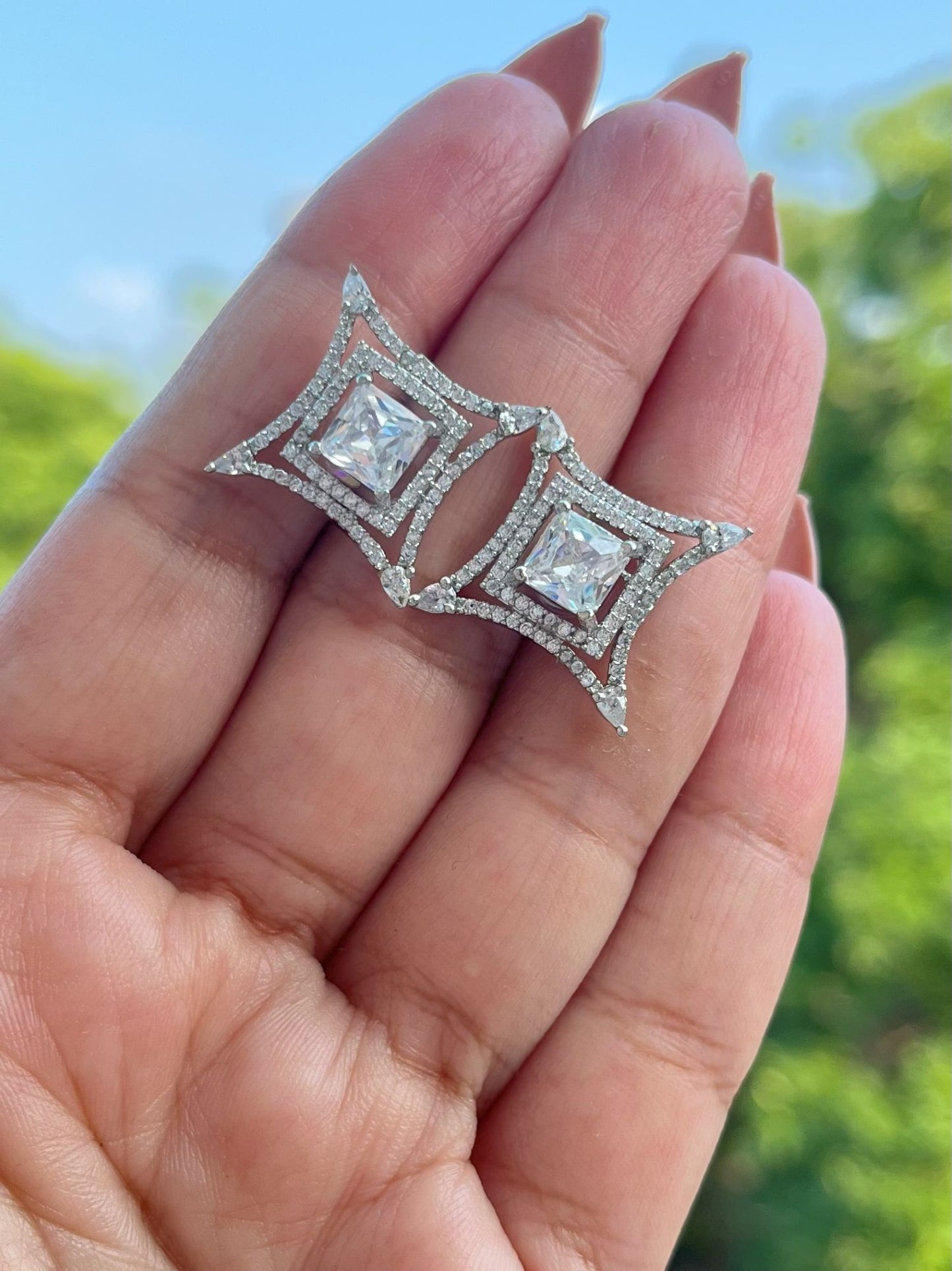 Shop Anvi Premium Stud Earrings In AD online in India. Shop AD earrings, bridal AD jewelry, AD necklace sets for weddings, engagements and parties.  