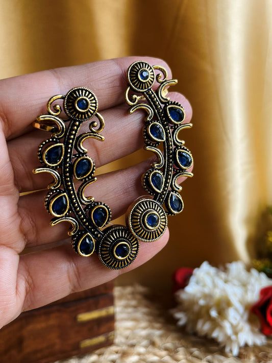 Buy Dull Golden Blue Stone Traditional Ear Cuffs online in India. Shop oxidized jewellery for festivals and office and daily wearing in affordable range.