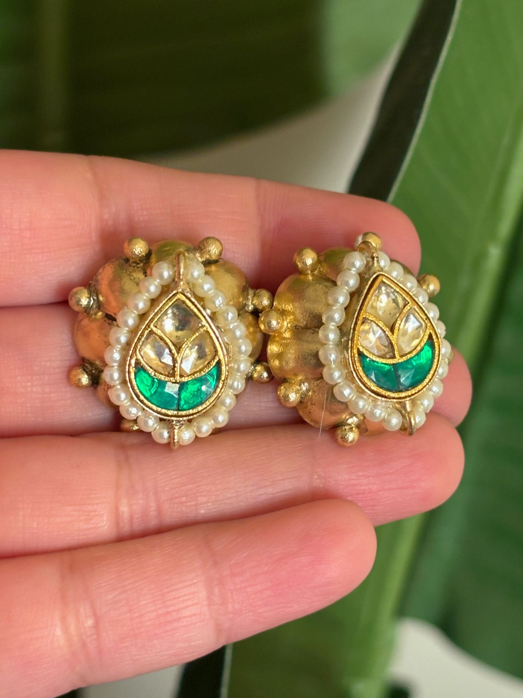 Shop Traditional Drop Shaped Kundan Stud Earrings In Green online in India. Shop from an exclusive range of CZ jewellery, gold plated, silver, mehendi polish earrings. -first