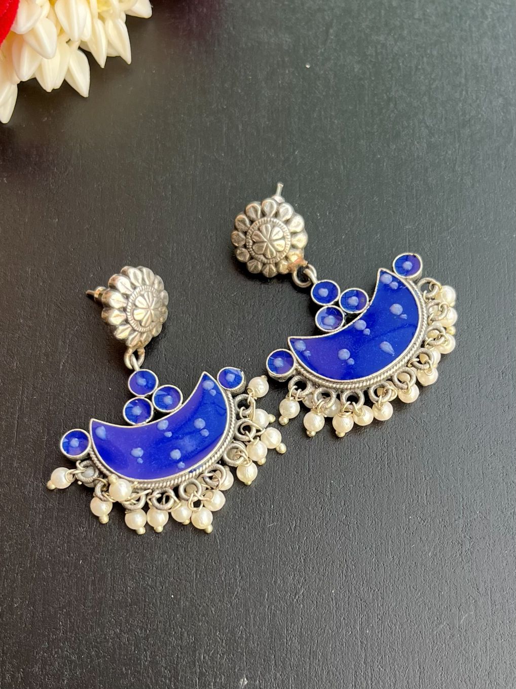 Buy Pearl Drops Mystical Moon Blue Small Chandbali Earrings online in India. Shop oxidized jewellery for festivals and office and daily wearing in affordable range.-side