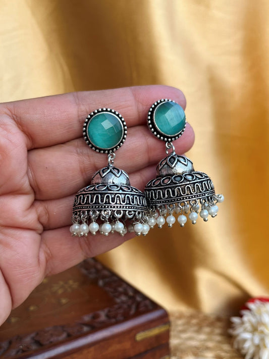 Buy Avantika Green Stone Oxidized Jhumka Earrings online in India. Shop oxidized jewellery for festivals and office and daily wearing in affordable range.