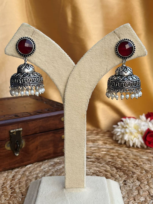Buy Avantika Red Stone Oxidized Jhumka Earrings online in India. Shop oxidized jewellery for festivals and office and daily wearing in affordable range.