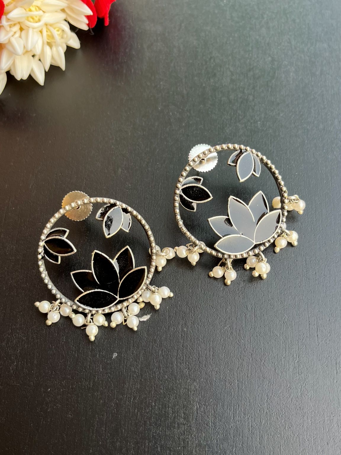 Buy Hand Painted Pearl Drops Lotus Oxidized Stud Earrings In Black online in India. Shop oxidized jewellery for festivals and office and daily wearing in affordable range.
