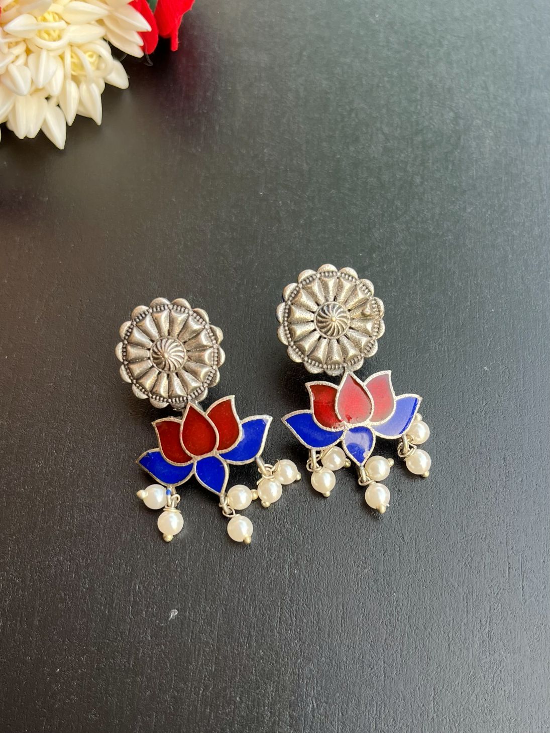Buy Antique Polish Silver Lotus Meenakari Earrings In Multicolour online in India. Shop oxidized jewellery for festivals and office and daily wearing in affordable range.