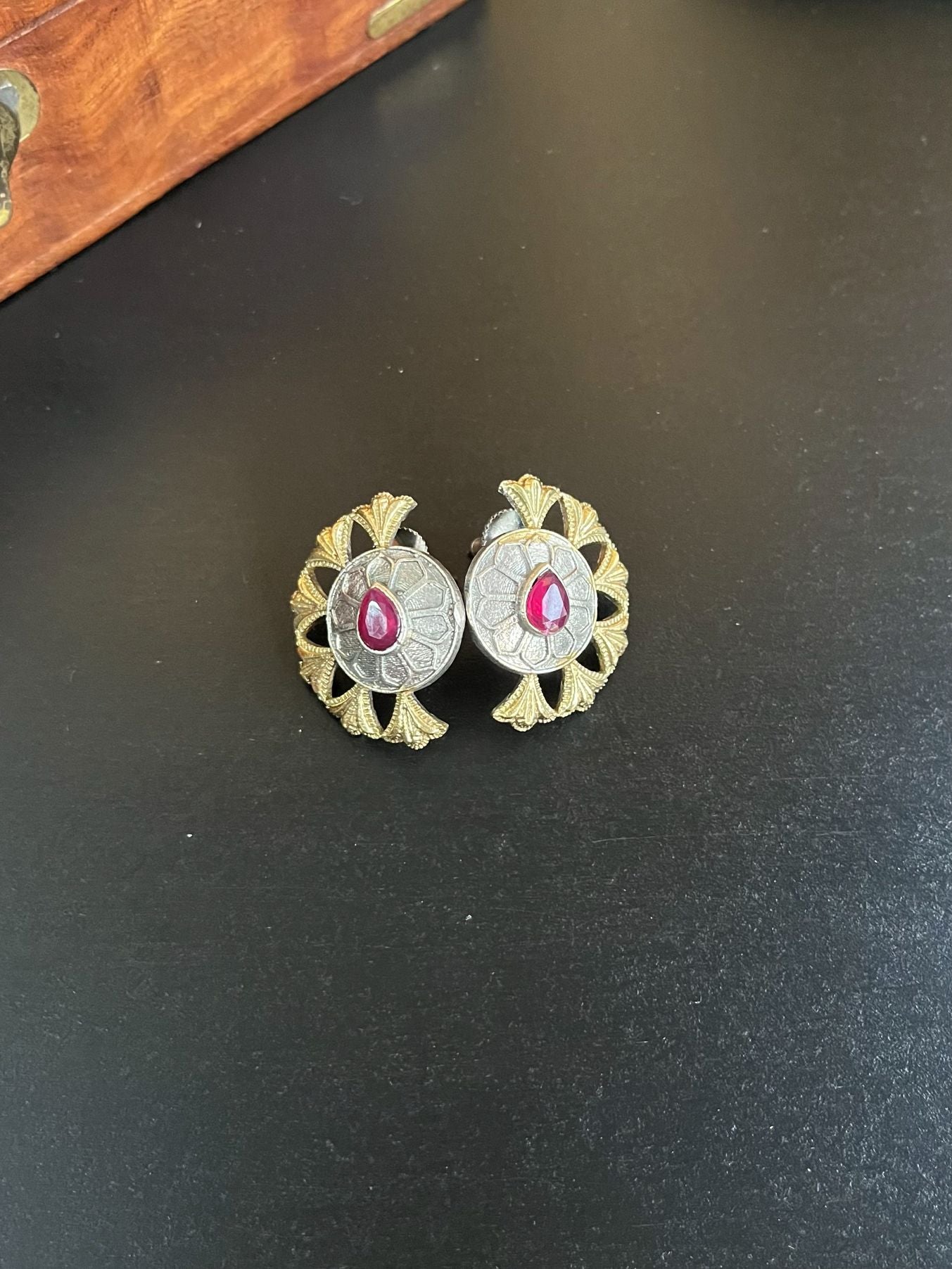Buy Dual Tone Oxidized Silver Stud Earrings In Red Stone online in India. Shop oxidized jewellery for festivals and office and daily wearing in affordable range.