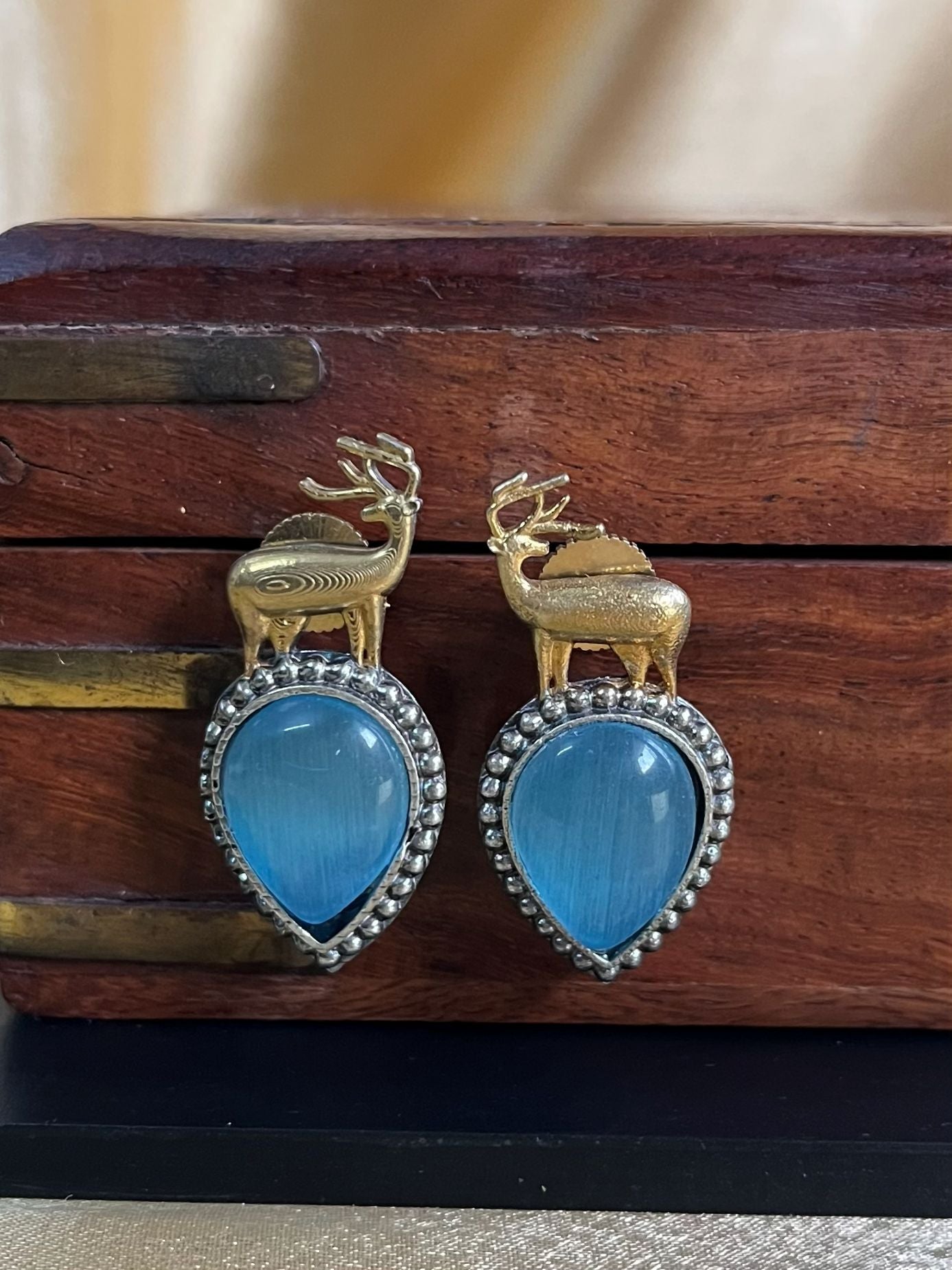 Buy Monalisa Sky Blue Stone Deer Shaped Stud Earrings online in India. Shop oxidized jewellery for festivals and office and daily wearing in affordable range.