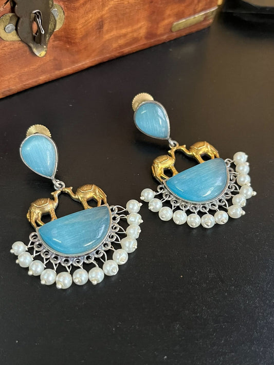 Buy Monalisa Aqua Blue Stone Silver Lookalike Dual Tone Earrings online in India. Shop oxidized jewellery for festivals and office and daily wearing in affordable range.