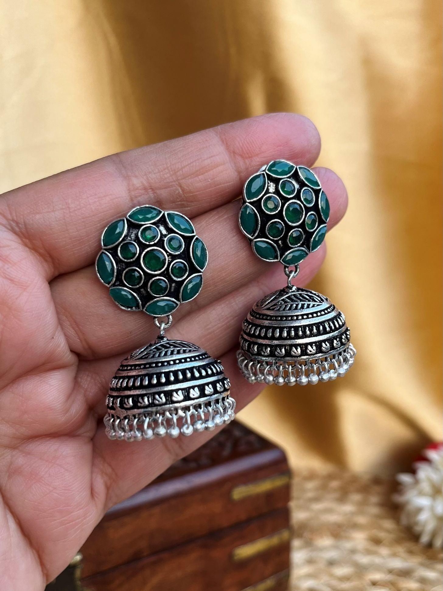 Buy Samhita Oxidised Mid Sized Green Jhumka Earrings online in India. Shop oxidized jewellery for festivals and office and daily wearing in affordable range.