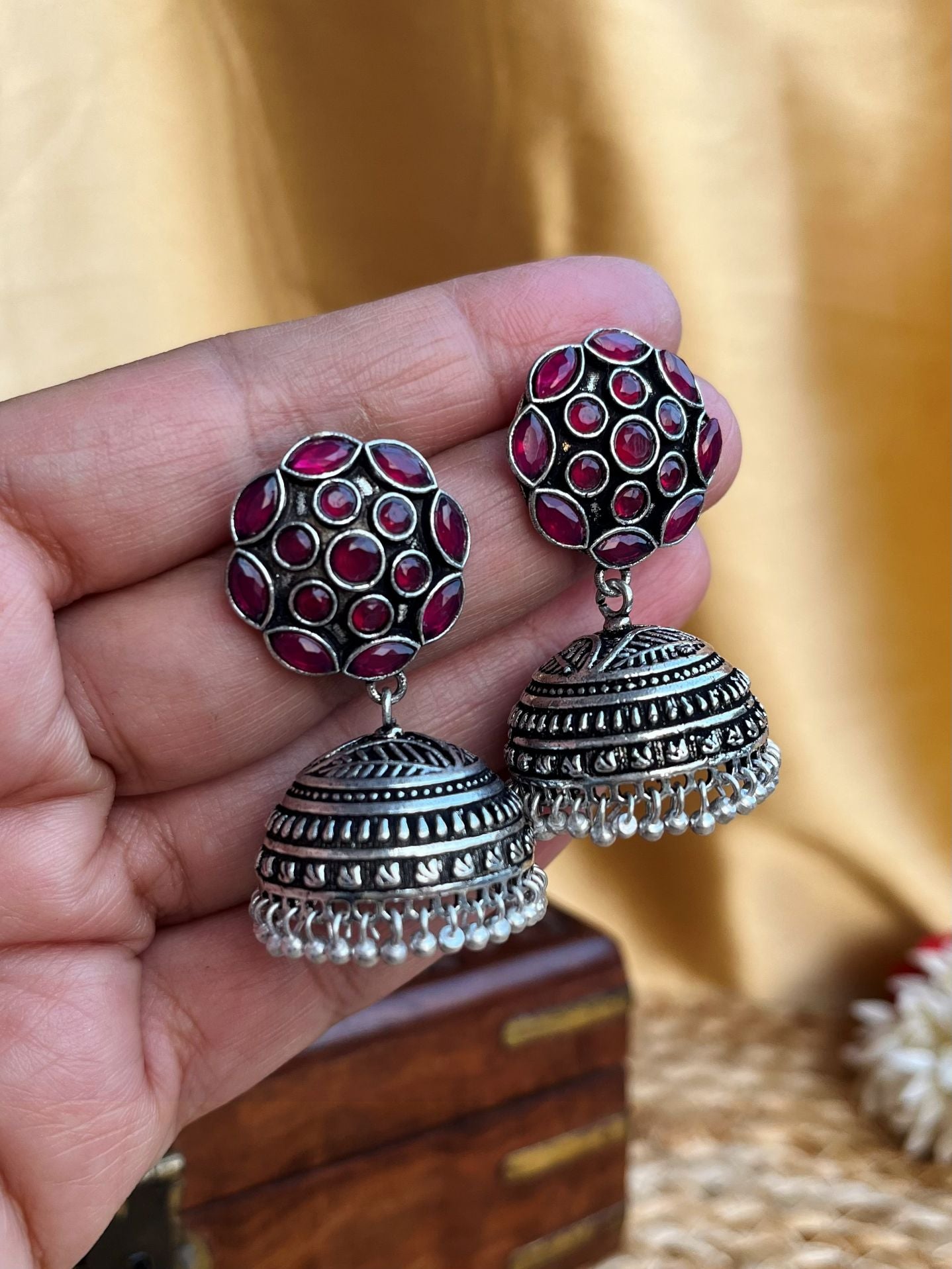 Buy Samhita Oxidised Mid Sized Red Jhumka Earrings online in India. Shop oxidized jewellery for festivals and office and daily wearing in affordable range.