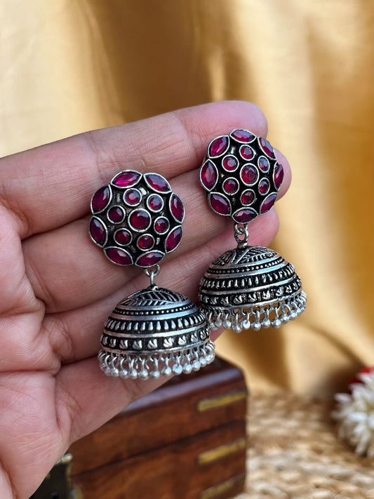 Buy Samhita Oxidised Mid Sized Red Jhumka Earrings online in India. Shop oxidized jewellery for festivals and office and daily wearing in affordable range.