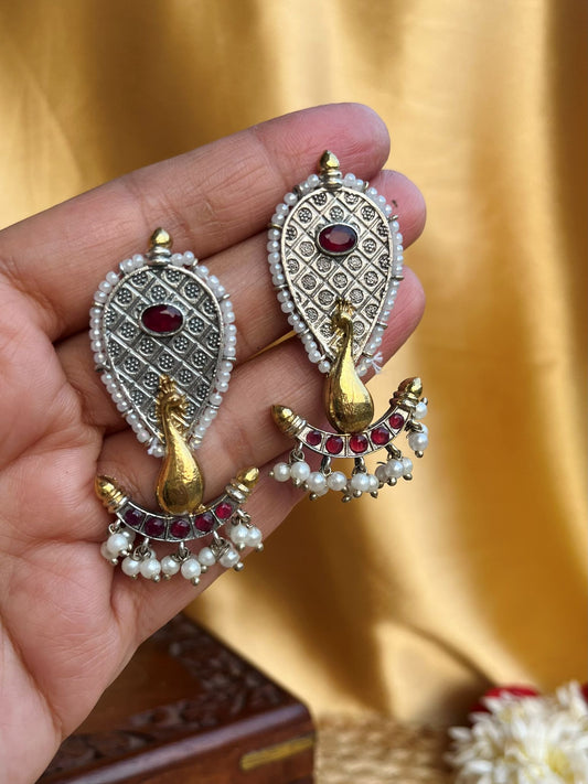Buy Peacock Design Dual Tone Antique Look Earrings In Red online in India. Shop oxidized jewellery for festivals and office and daily wearing in affordable range.