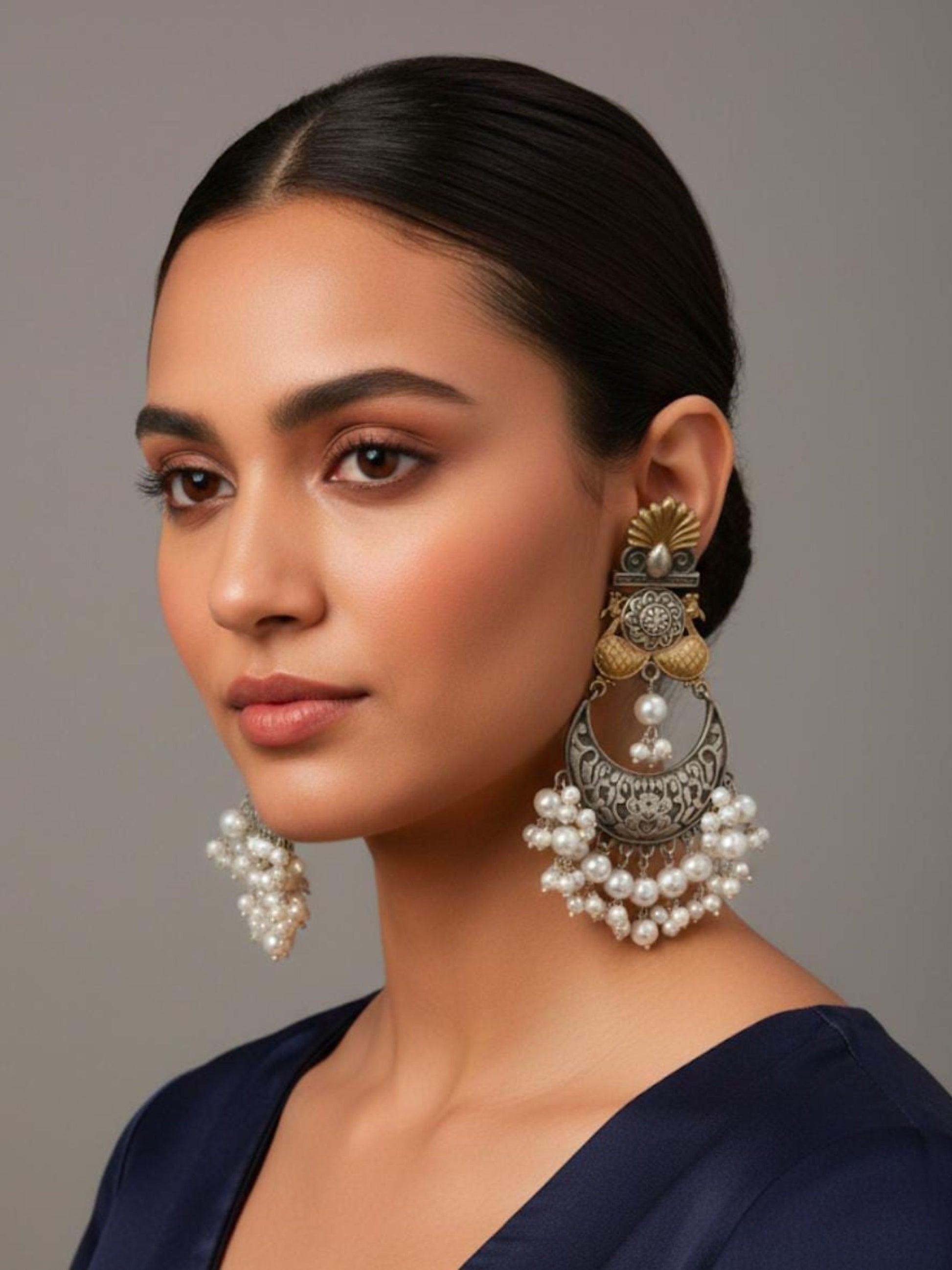 Buy Kavya Dual Tone Chandelier Pearl Drops Oxidised Earrings online in India. Shop oxidized jewellery for festivals and office and daily wearing in affordable range.-first