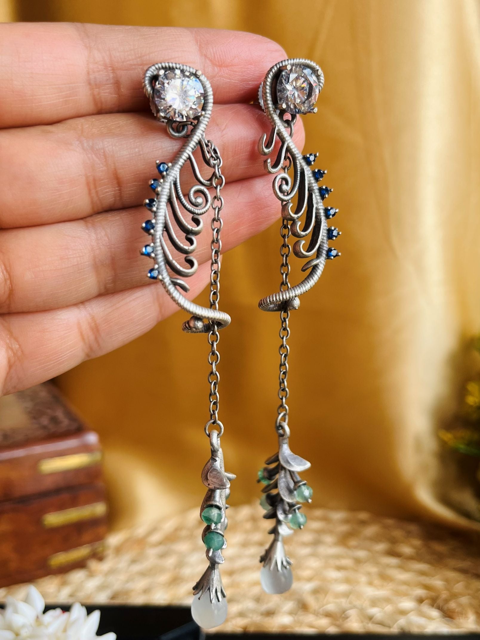 Buy Zehra Oxidised Brass Leaf Dangle Earrings In White Stone online in India. Shop oxidized jewellery for festivals and office and daily wearing in affordable range.-first
