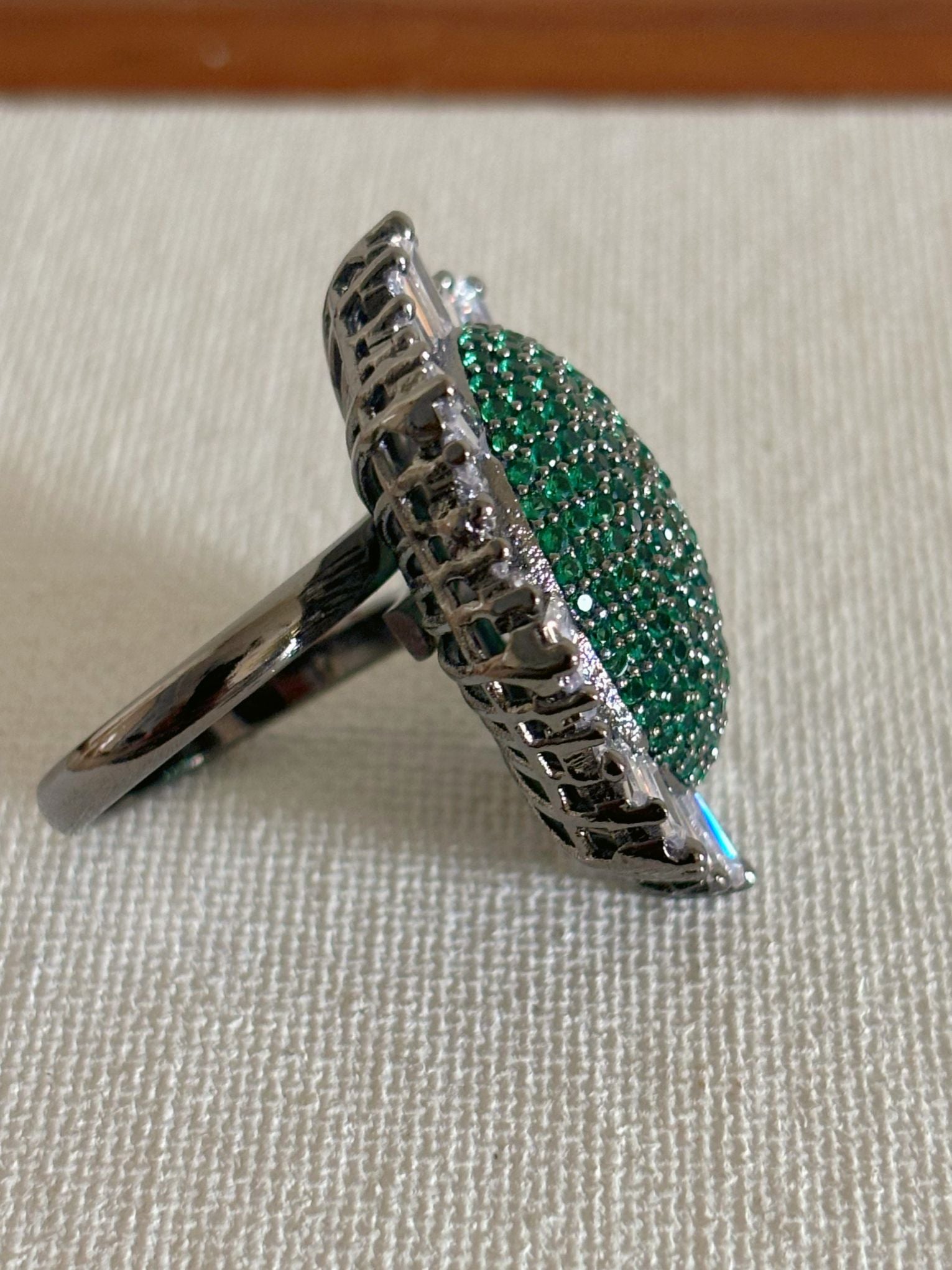 Shop Nano Setting Green Stone Cocktail AD Ring online in India. Shop from an exclusive range of zircon jewellery, bridal wedding jewellery, silver plated earrings, rhodium plated rings, AD rings, AD earrings for office parties, cocktail dresses and sangeet night. -back
