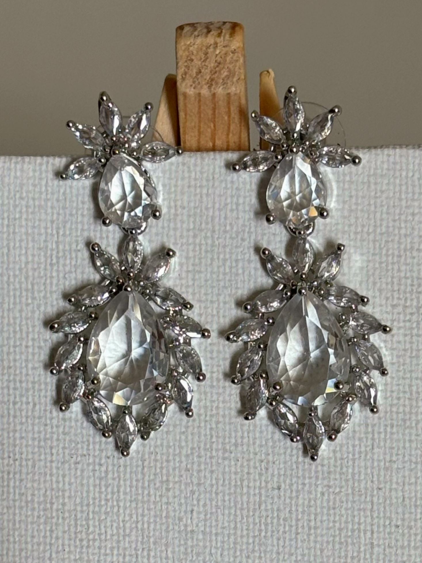 Shop Stylish Double Drop White Stone AD Earrings online. Shop from an exclusive range of zircon earrings, bridal AD jewelry, silver plated earrings, rhodium plated jewellery, AD earrings, AD necklace sets for coats, gowns and lehengas.  -first