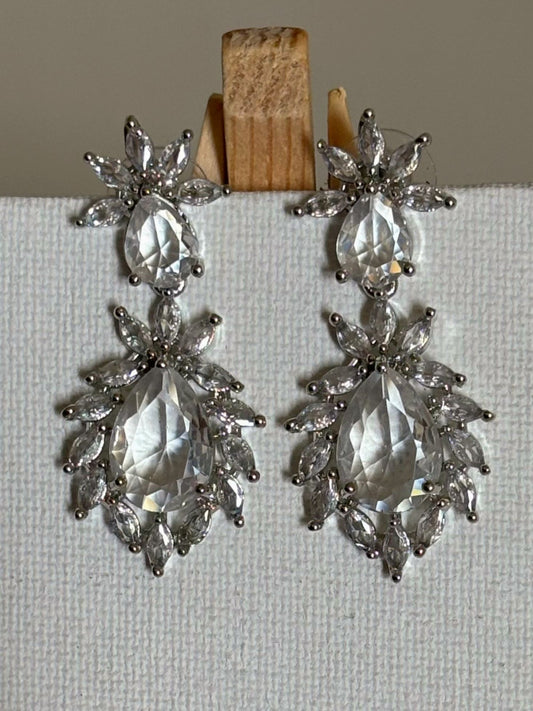 Shop Stylish Double Drop White Stone AD Earrings online. Shop from an exclusive range of zircon earrings, bridal AD jewelry, silver plated earrings, rhodium plated jewellery, AD earrings, AD necklace sets for coats, gowns and lehengas.  -first