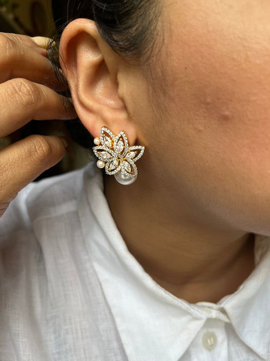 Buy Floral Golden Stud Earrings With Pearl Drop In AD online in India. Shop AD earrings, bridal AD jewelry, AD necklace sets for weddings, engagements and parties. -front