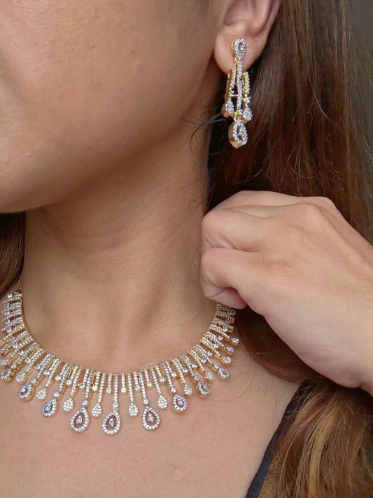 Shop Beautiful Gold Polish Set In AD For Sarees online in India. Explore elegant bridal AD jewellery online. Shop premium bridal jewellery sets in Zircon, AD, Kundan, Victorian Diamond. Collection best suited for Indian weddings, parties and special occasions. Choose AD Necklace in gold polish for sarees, lehengas and gowns. back