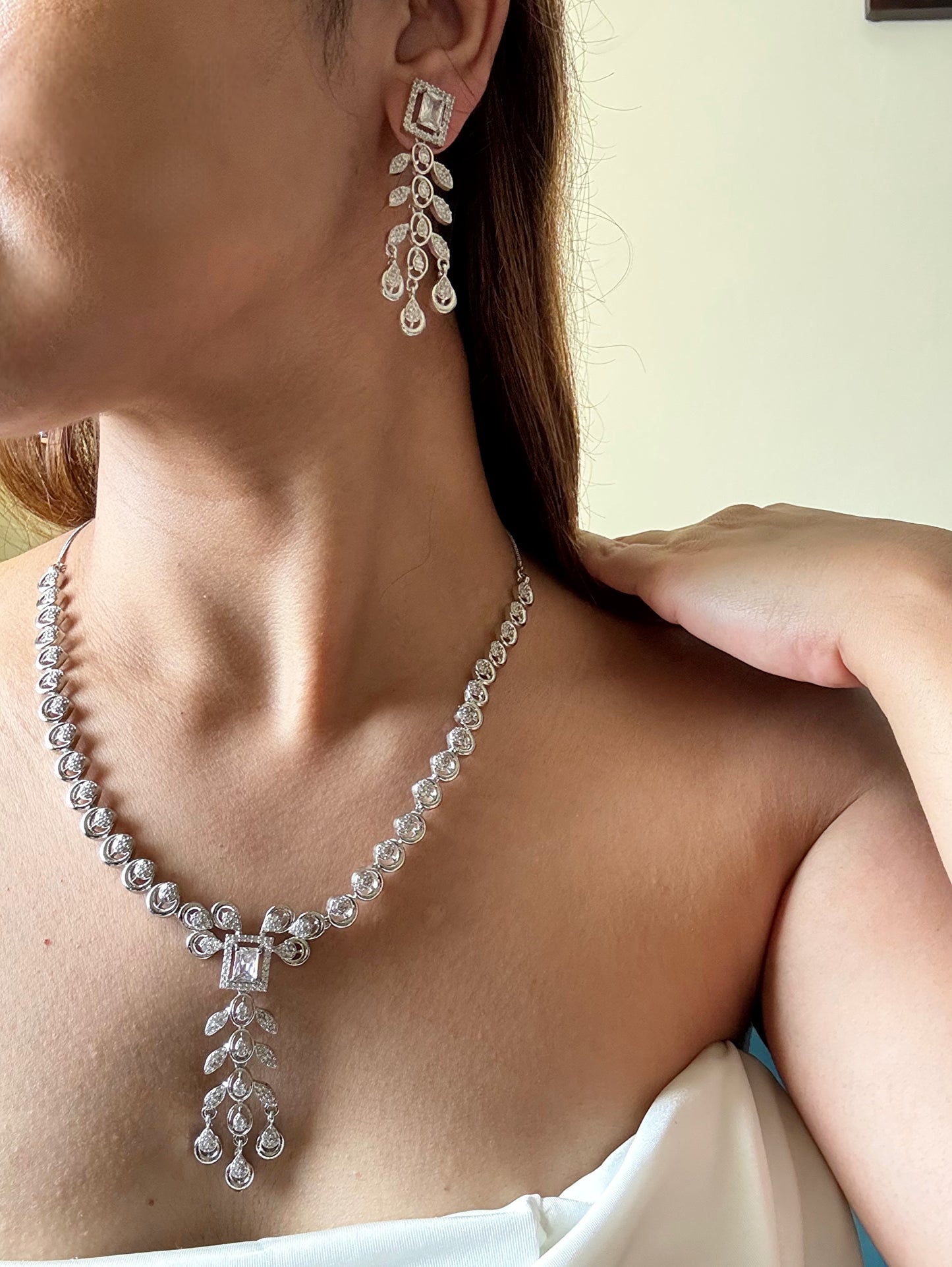 Buy AD Set With Maang Tikka online in India with earrings. Shop an exclusive range of zircon jewellery, Indian wedding jewelry, kundan jewellery, AD earrings, AD necklace. -second