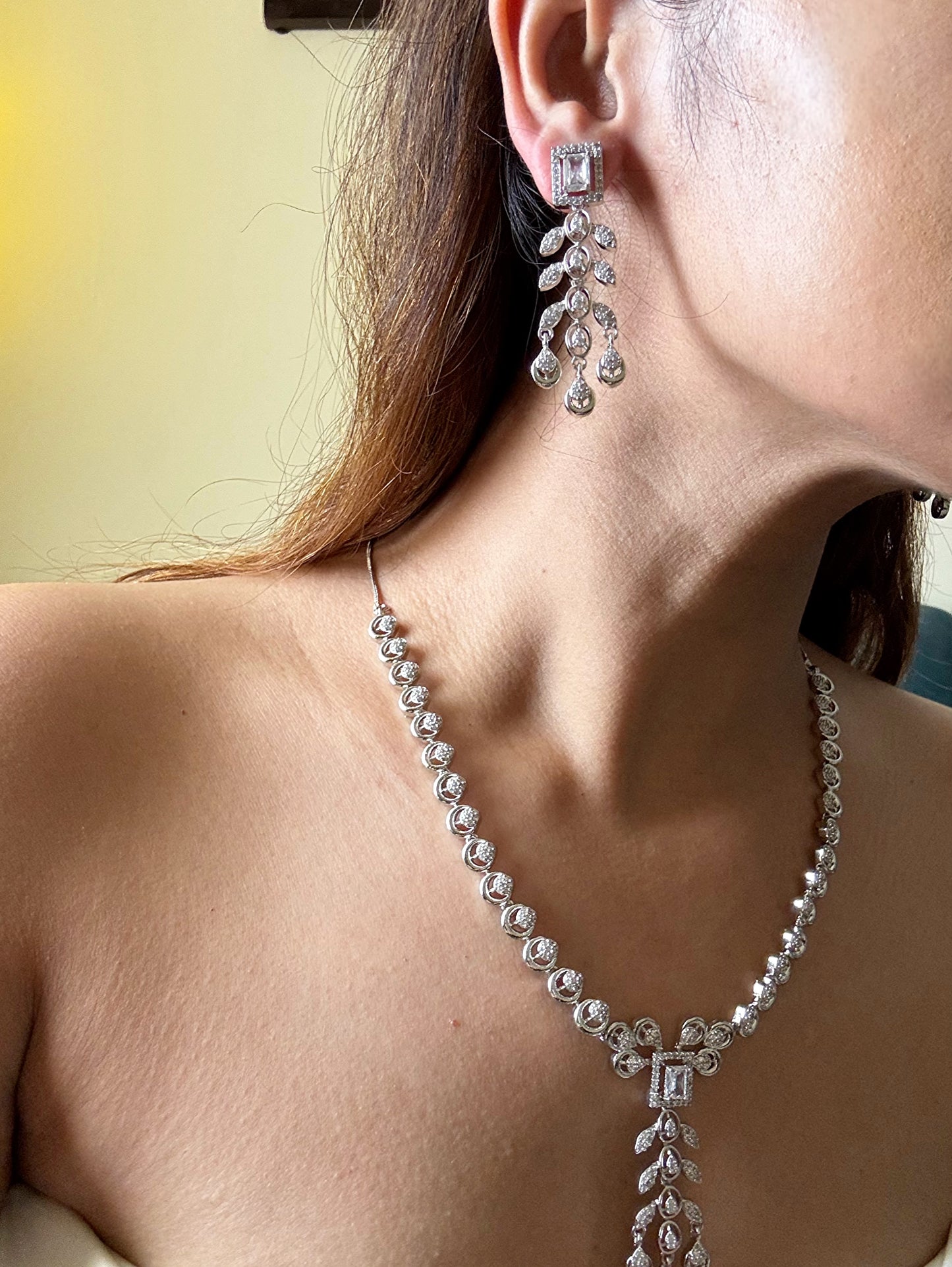 Buy AD Set With Maang Tikka online in India with earrings. Shop an exclusive range of zircon jewellery, Indian wedding jewelry, kundan jewellery, AD earrings, AD necklace. -third