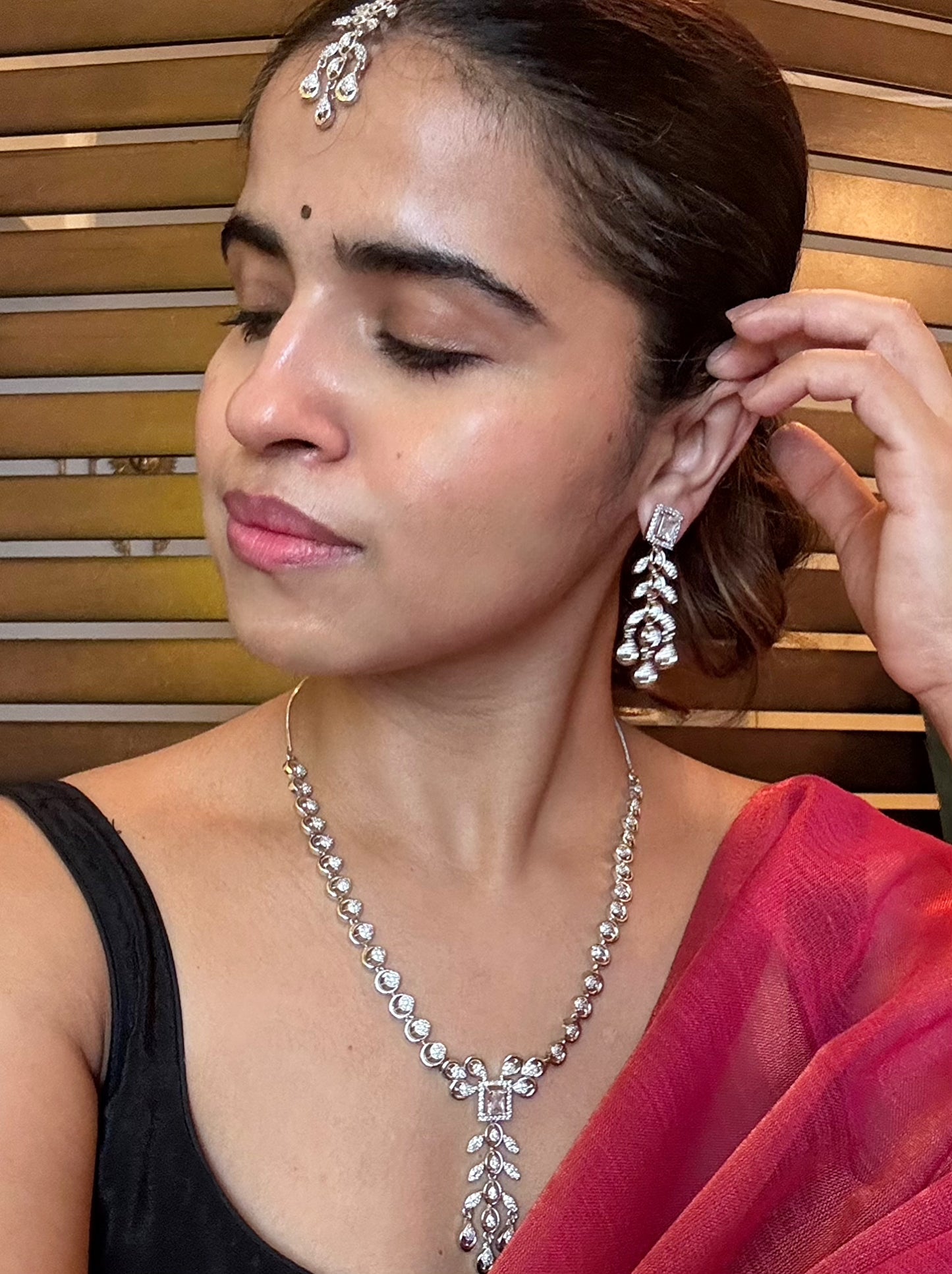 Buy AD Set With Maang Tikka online in India with earrings. Shop an exclusive range of zircon jewellery, Indian wedding jewelry, kundan jewellery, AD earrings, AD necklace. -front