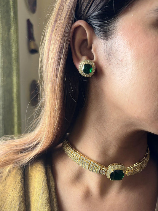 Shop Green Stone Choker in AD with Gold Finish online in India. Explore elegant bridal AD jewellery online. Shop premium bridal jewellery sets in Zircon, AD, Kundan, Victorian Diamond. Collection best suited for Indian weddings, parties and special occasions. Choose AD Necklace in green stone for sarees, lehengas and gowns. -first