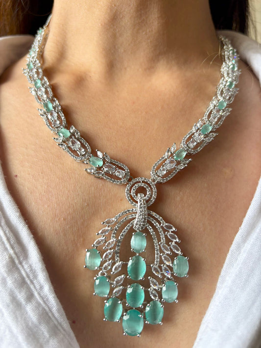 Shop NL25A032 Royal Mint Green Doublet Stone Heavy Necklace In AD online in India. Explore elegant bridal AD jewellery online. Shop premium bridal jewellery sets in Zircon, AD, Kundan, Victorian Diamond. Collection best suited for Indian weddings, parties and special occasions. Choose AD Necklace in pink stone for sarees, lehengas and gowns. -front
