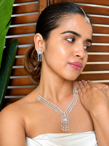 Buy AD Set With Maang Tikka online in India with earrings. Shop an exclusive range of zircon jewellery, Indian wedding jewelry, kundan jewellery, AD earrings, AD necklace.