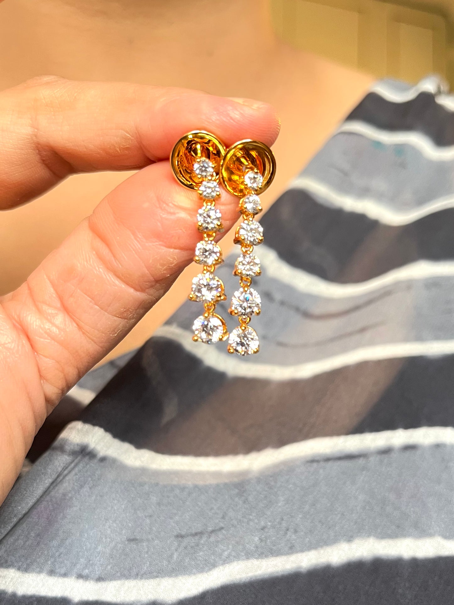 Shop Gayatri Solitaire String In AD Stones In Gold Plating online in India. Explore elegant bridal AD jewellery online. Shop premium bridal jewellery sets in Zircon, AD, Kundan, Victorian Diamond. Collection best suited for Indian weddings, parties and special occasions. Buy solitaire string sets in real look for sarees, lehengas and gowns. -withearrings