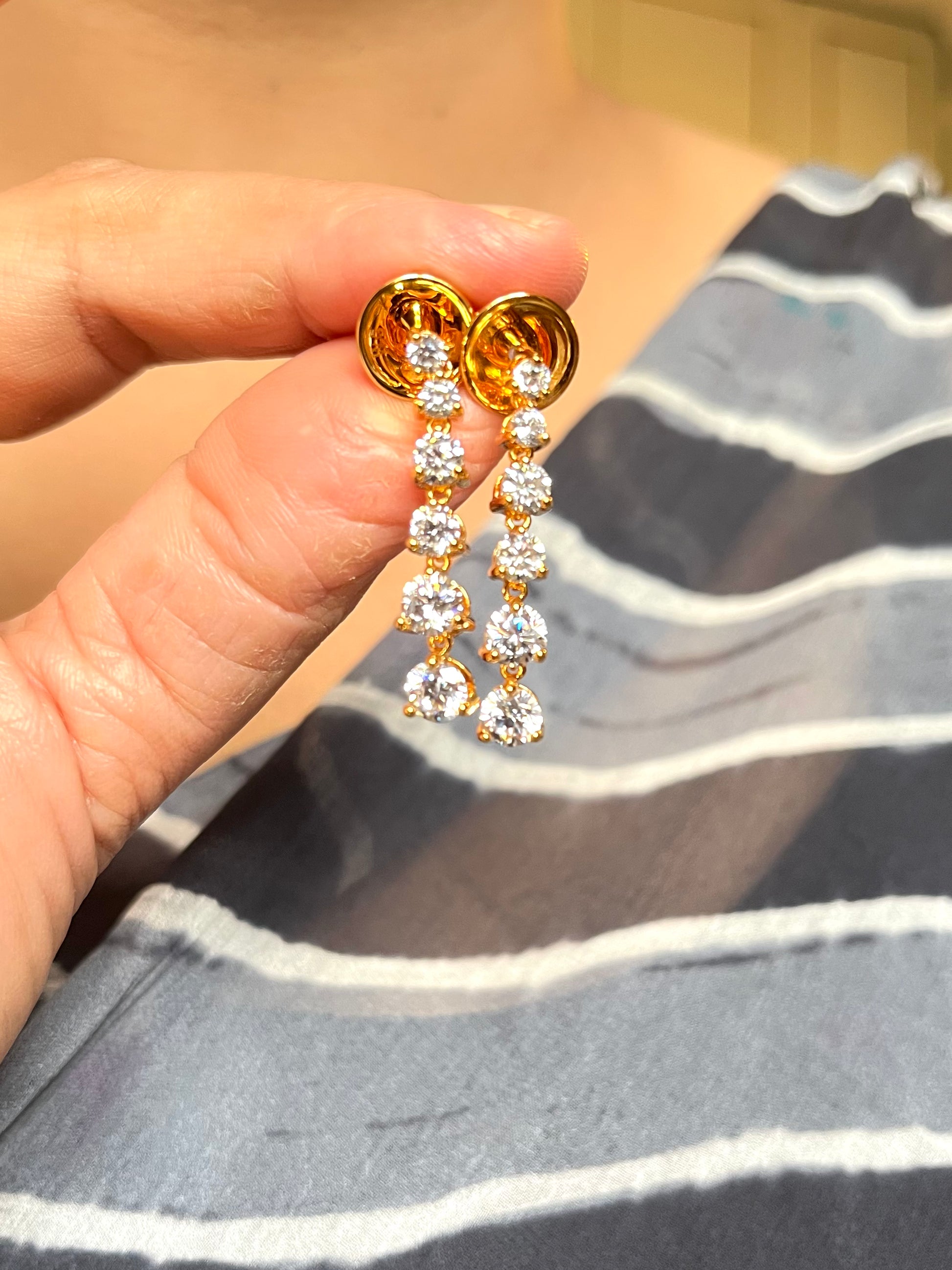 Shop Gayatri Solitaire String In AD Stones In Gold Plating online in India. Explore elegant bridal AD jewellery online. Shop premium bridal jewellery sets in Zircon, AD, Kundan, Victorian Diamond. Collection best suited for Indian weddings, parties and special occasions. Buy solitaire string sets in real look for sarees, lehengas and gowns. -withearrings
