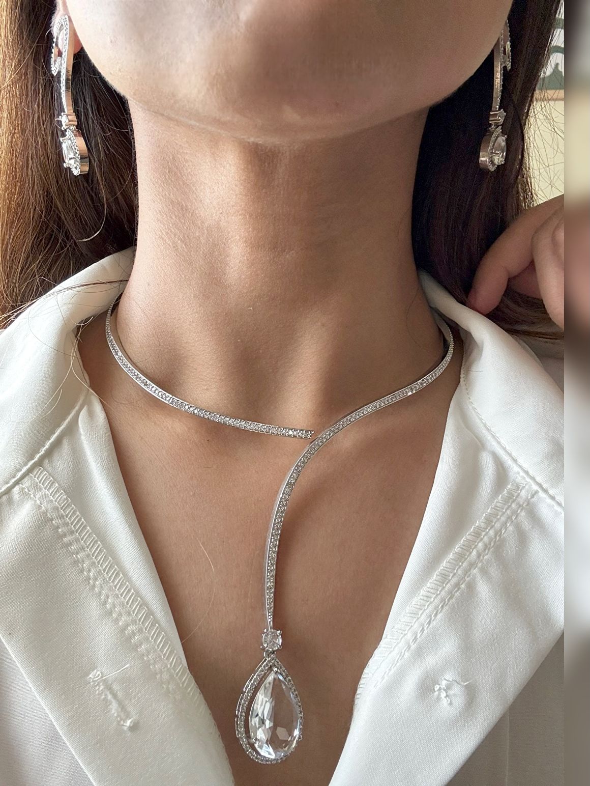 Shop Hasli Set With White Drop in AD online in India. Perfect for brides seeking elegant AD jewellery online. Explore premium bridal jewellery online in AD, ideal for Indian weddings and special occasions. Shop AD jewellery in green stone online. -side