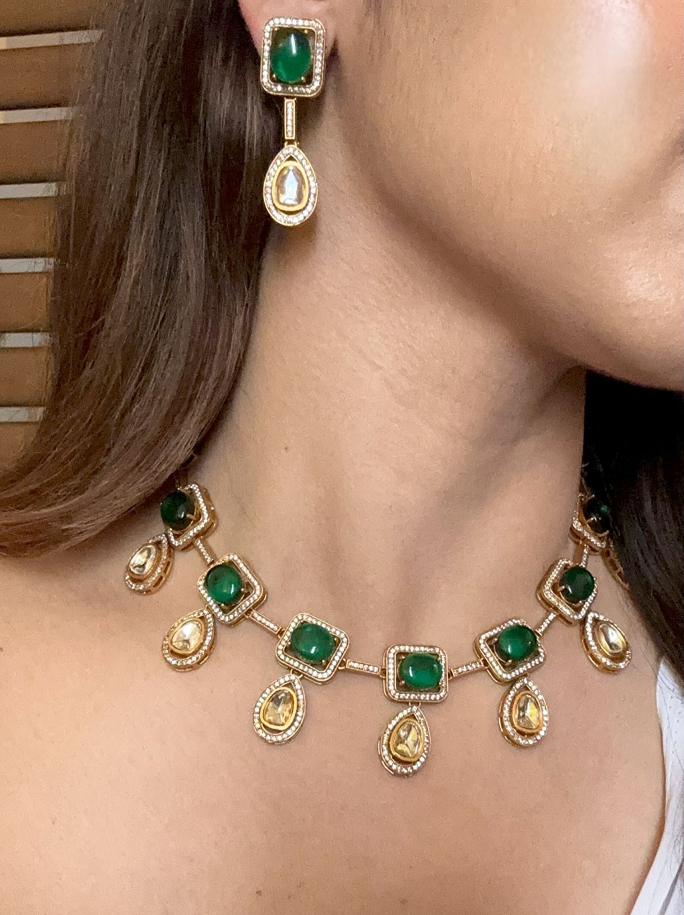 Buy Neerja Green Kundan Round Necklace online in India with earrings. Shop an exclusive range of zircon jewellery, Indian wedding jewelry, kundan jewellery, AD earrings, AD necklace. -side
