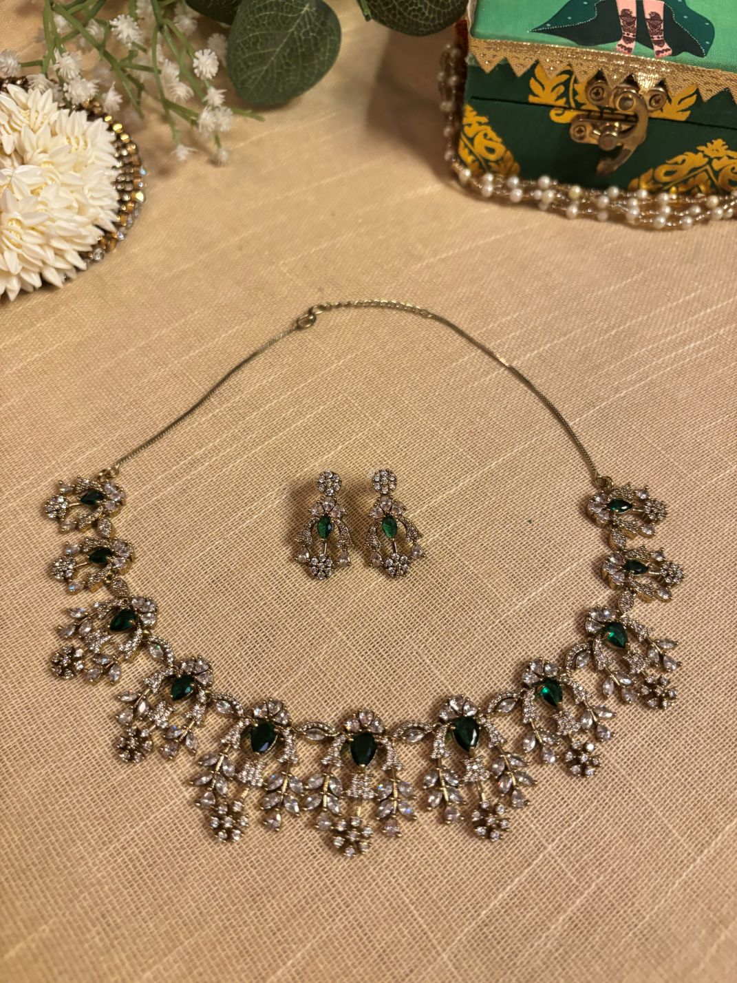 Buy Antique Polish AD Set With Earrings In Green online in India with earrings. Shop an exclusive range of zircon jewellery, Indian wedding jewelry, kundan jewellery, AD earrings, AD necklace. -FRONT