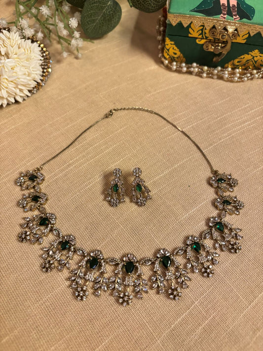 Buy Antique Polish AD Set With Earrings In Green online in India with earrings. Shop an exclusive range of zircon jewellery, Indian wedding jewelry, kundan jewellery, AD earrings, AD necklace. -FRONT