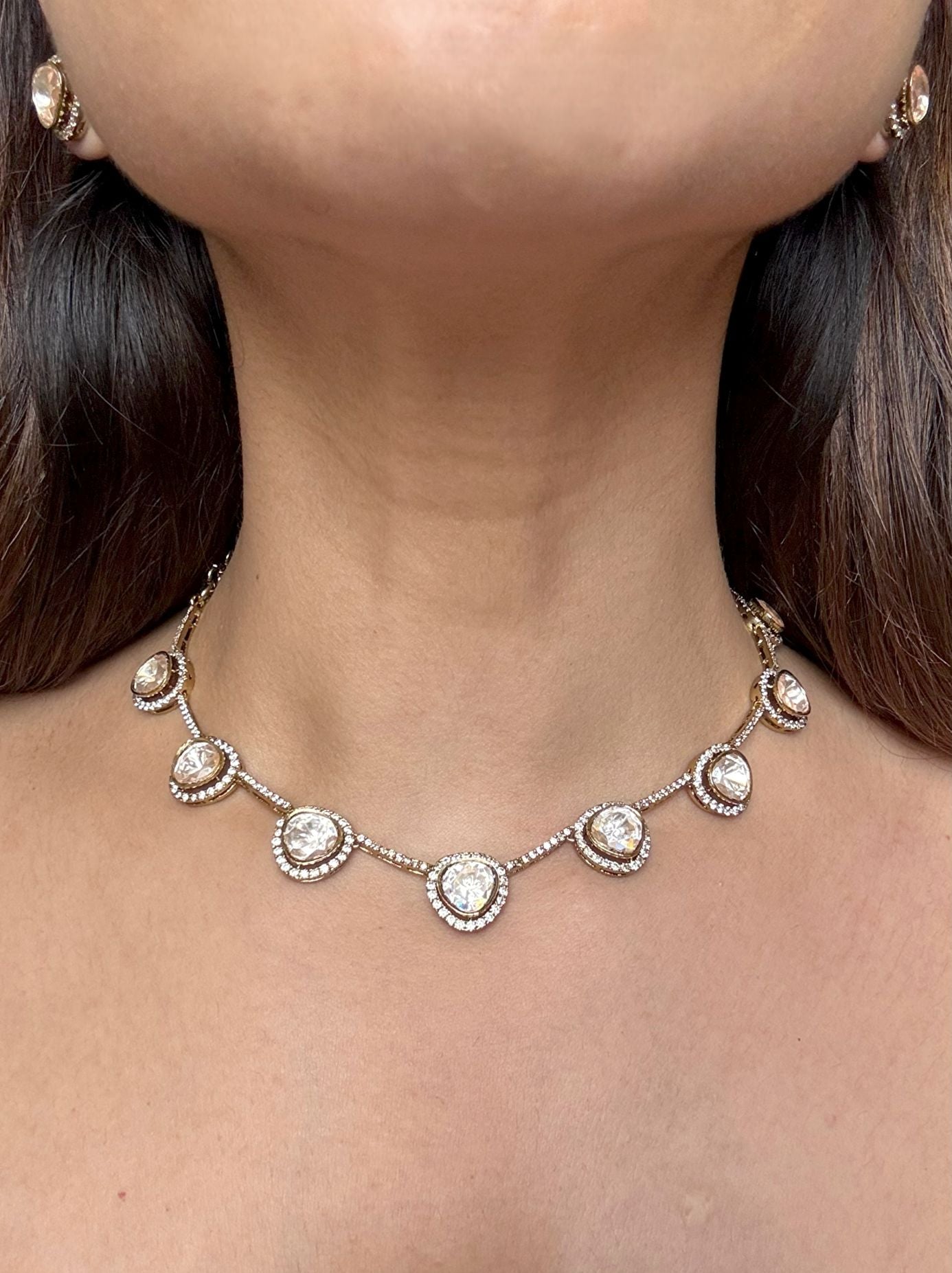 Shop Moissanite Stones Strings In Golden Polish & AD Stones online in India. Explore premium bridal jewellery online in AD. Shop AD jewellery in green stone online. -front