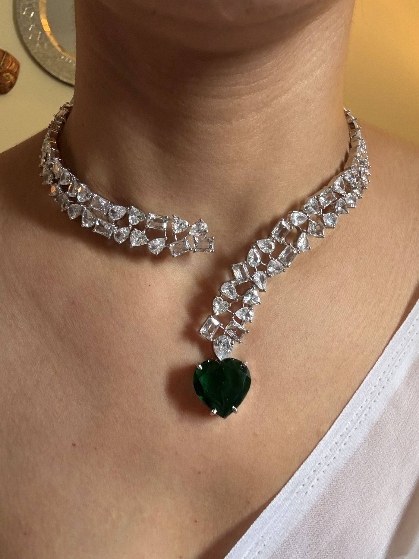 Shop Premium Hasli With Green Heart Pendant In CZ Stones online in India. Explore premium bridal jewellery online in AD. Shop AD jewellery in green stone online. -Front