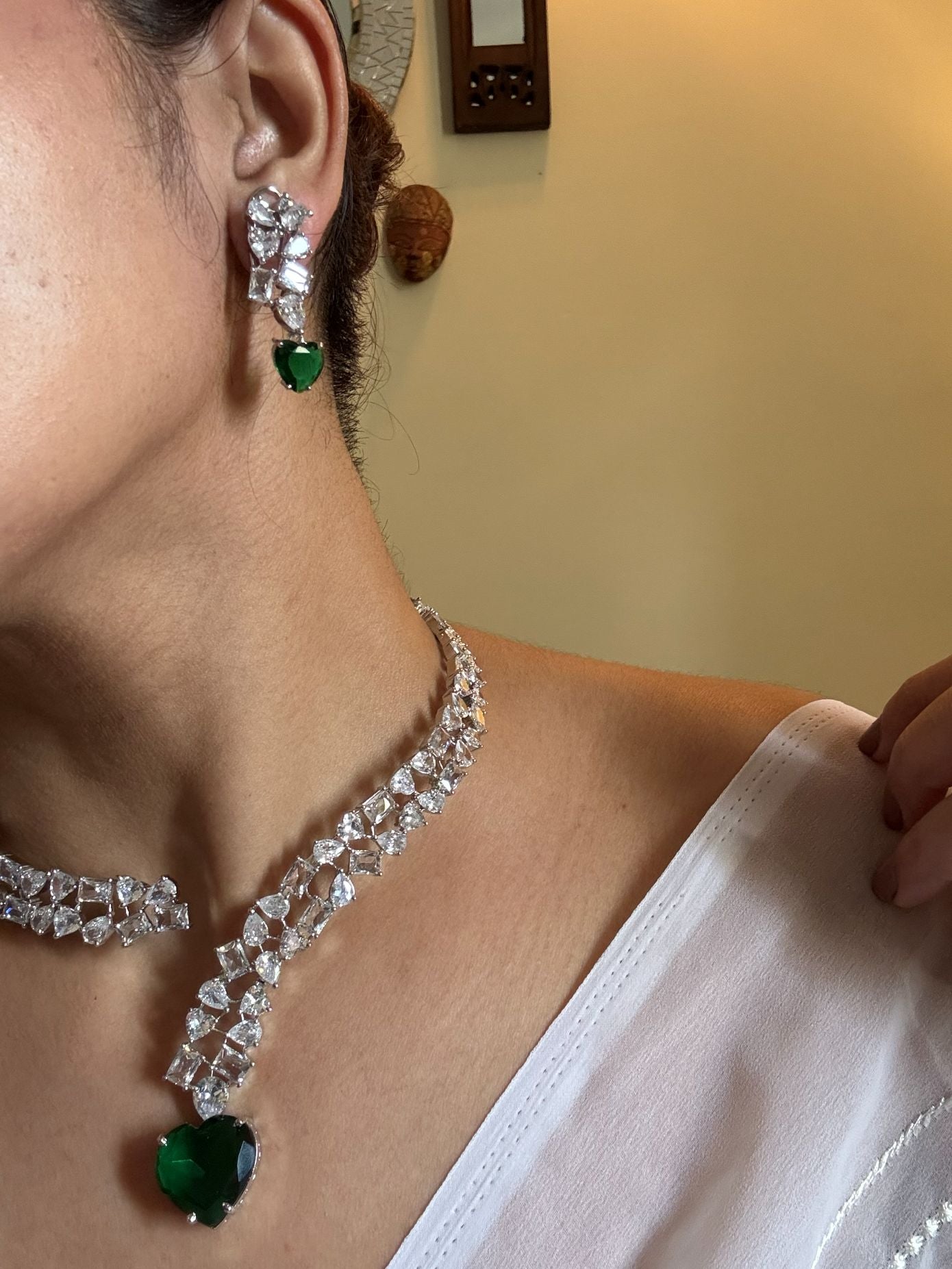 Shop Premium Hasli With Green Heart Pendant In CZ Stones online in India. Explore premium bridal jewellery online in AD. Shop AD jewellery in green stone online. -side