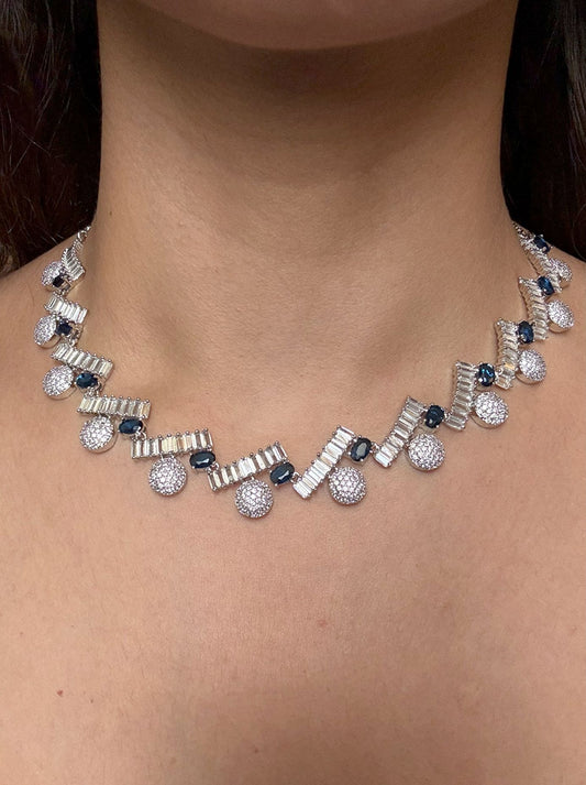 Buy Sparkling Elegance Rhodium Plated AD Set In Blue With Earrings online in India. Explore premium bridal jewellery online in AD. Shop AD jewellery in blue stone online. -front