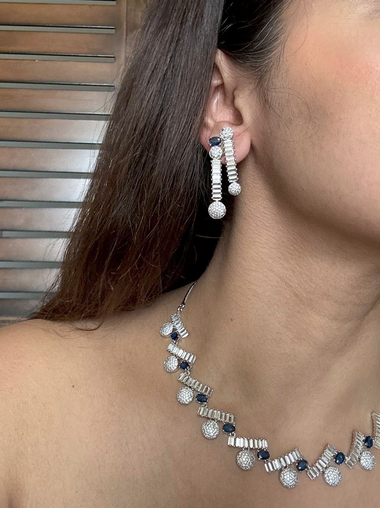 Buy Sparkling Elegance Rhodium Plated AD Set In Blue With Earrings online in India. Explore premium bridal jewellery online in AD. Shop AD jewellery in blue stone online. -side