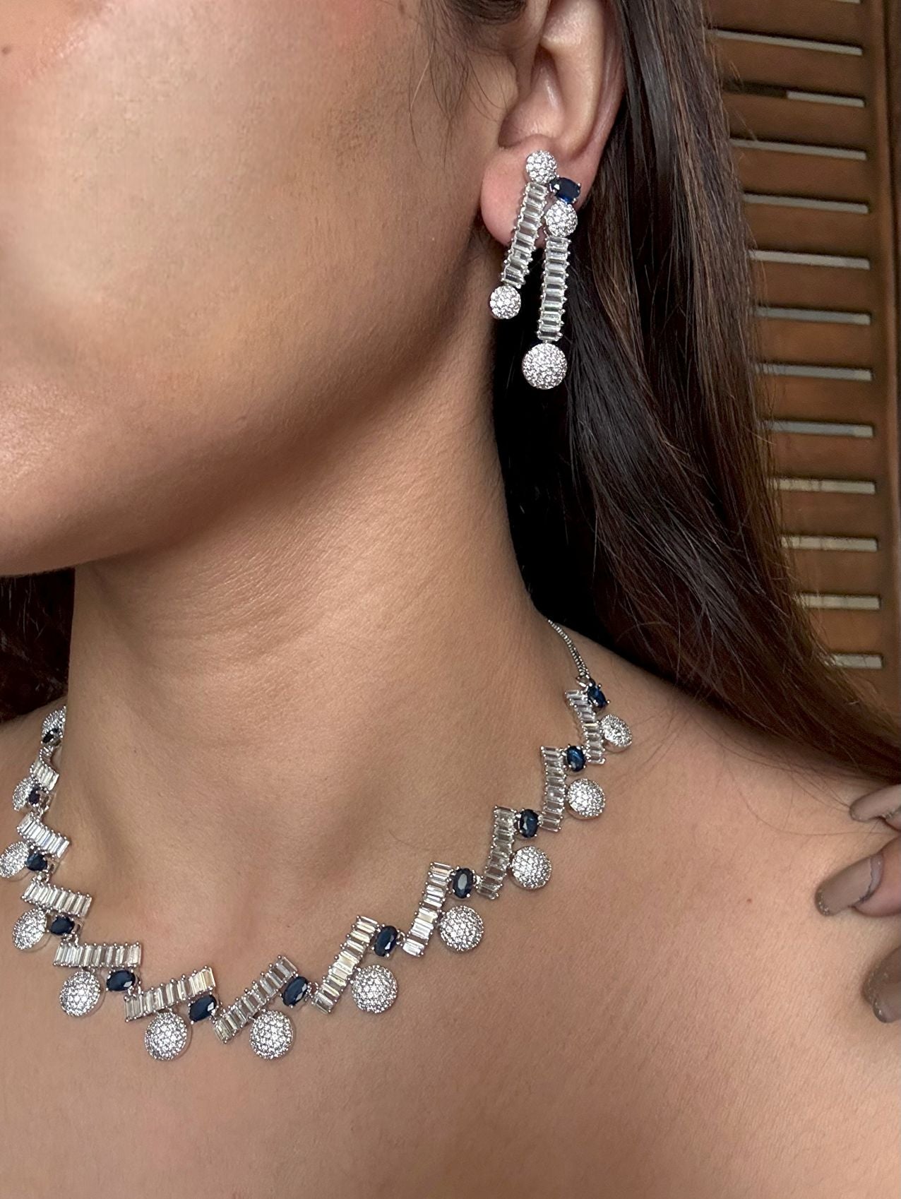 Buy Sparkling Elegance Rhodium Plated AD Set In Blue With Earrings online in India. Explore premium bridal jewellery online in AD. Shop AD jewellery in blue stone online. -first