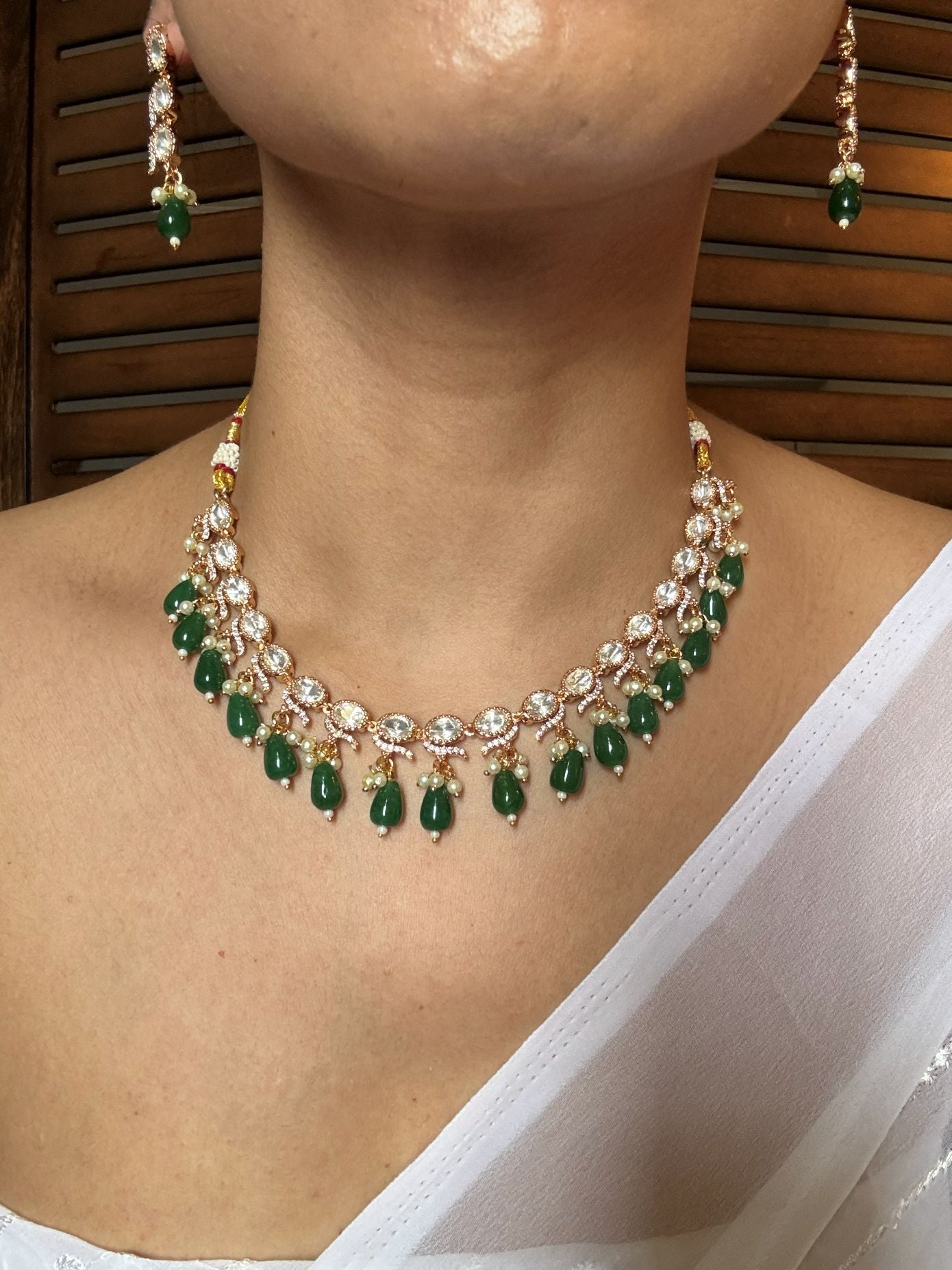 Buy Kundan Emerald Drops Necklace With Earrings online in India. Explore premium doublet stones jewellery online in AD. Shop AD jewellery in blue stone online. -first