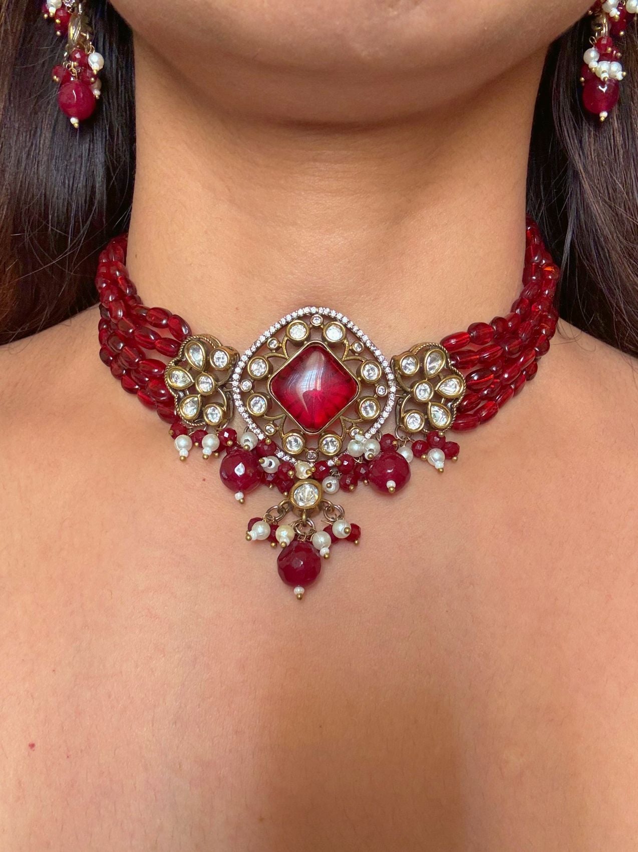 Buy Rajshree Red Stones Kundan Necklace With Earrings online in India. Shop from an exclusive range of CZ jewellery, gold plated, silver plated jewellery, gold polish earrings. -second