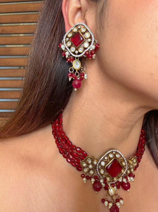 Buy Rajshree Red Stones Kundan Necklace With Earrings online in India. Shop from an exclusive range of CZ jewellery, gold plated, silver plated jewellery, gold polish earrings. -side
