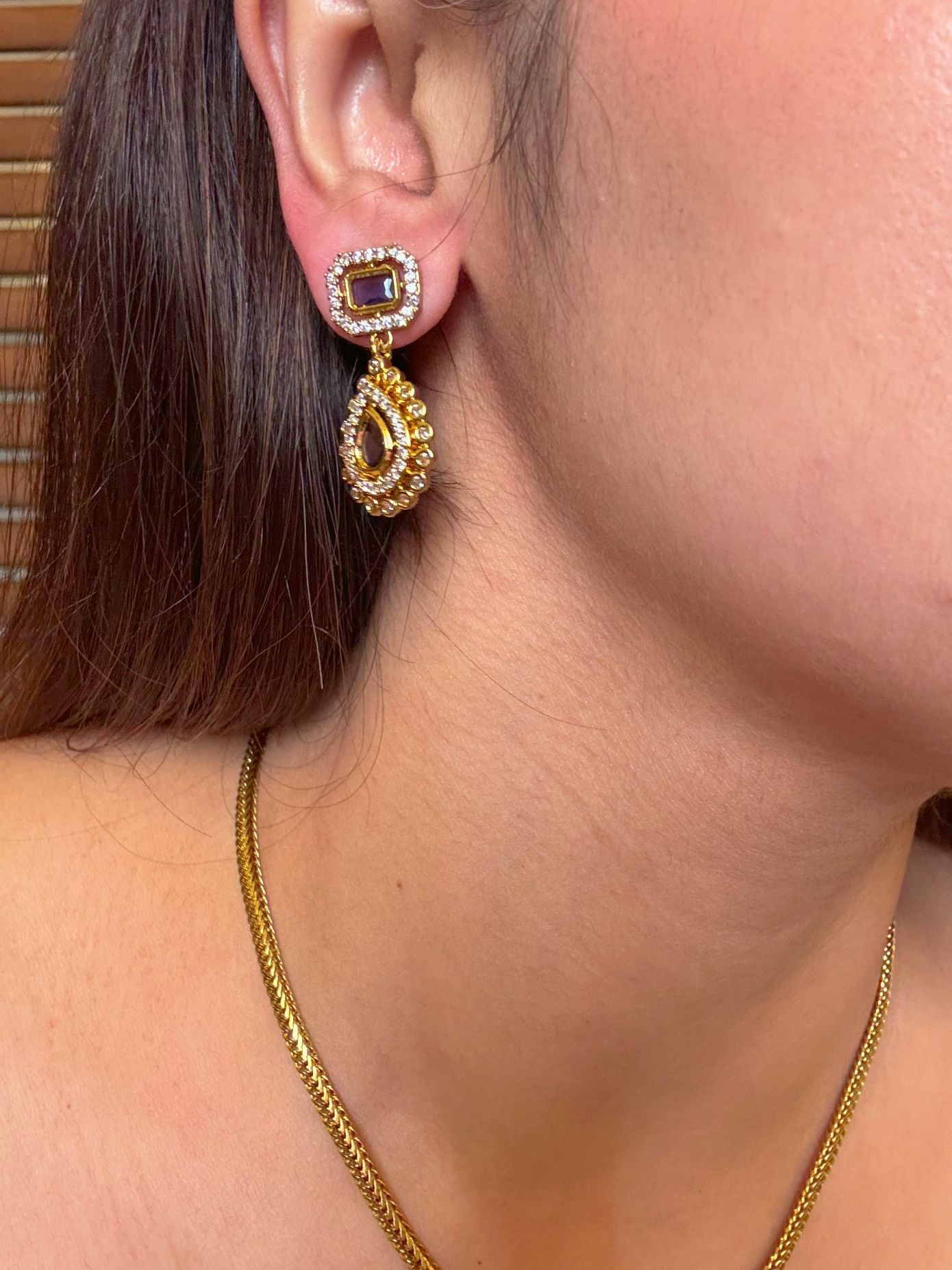 Buy Kamya Gold Plated AD Pendant Chain Necklace In Purple online in India. Shop from an exclusive range of CZ jewellery, gold plated, silver plated jewellery. -side