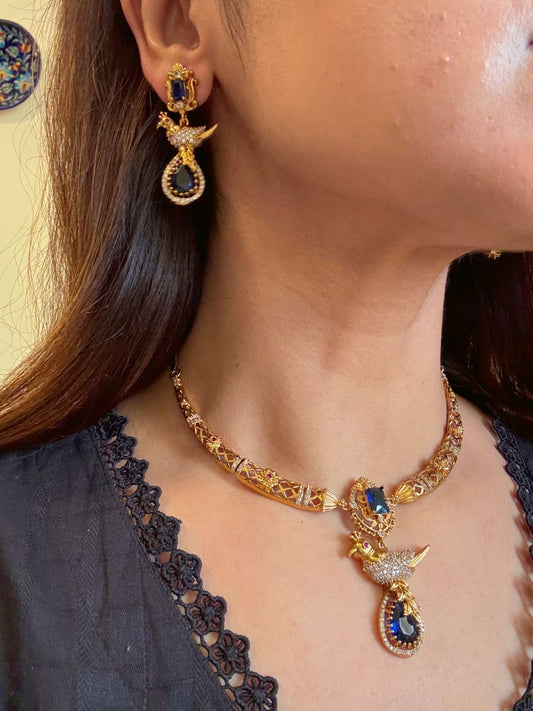 Buy Meghna Gold Plated Hasli Necklace In AD & Mint Green Stones online in India. Shop from an exclusive range of CZ jewellery, gold plated, silver plated jewellery. -side