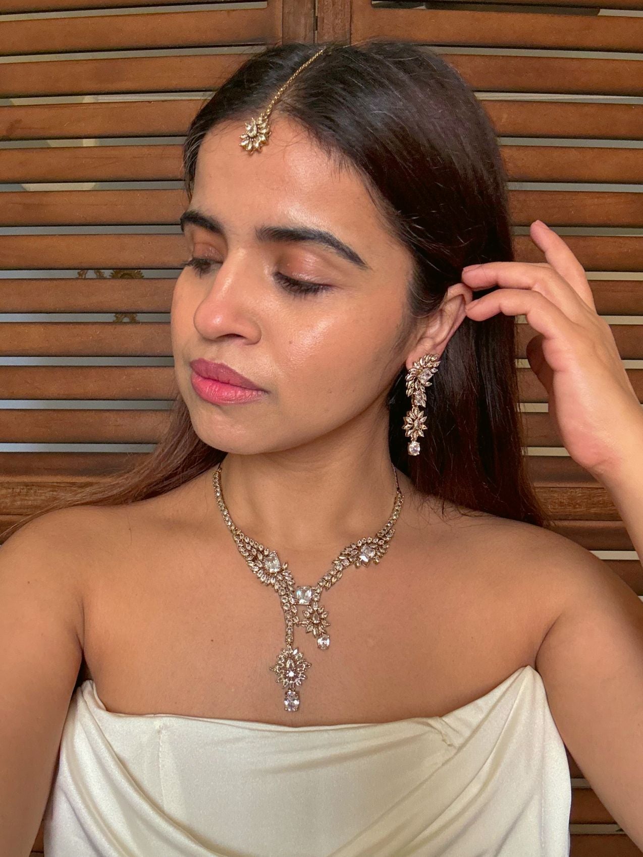Buy Aarini Wfirsthite AD Heavy Necklace With Maang Tikka online in India. Shop from an exclusive range of CZ jewellery, gold plated, silver plated jewellery. -full
