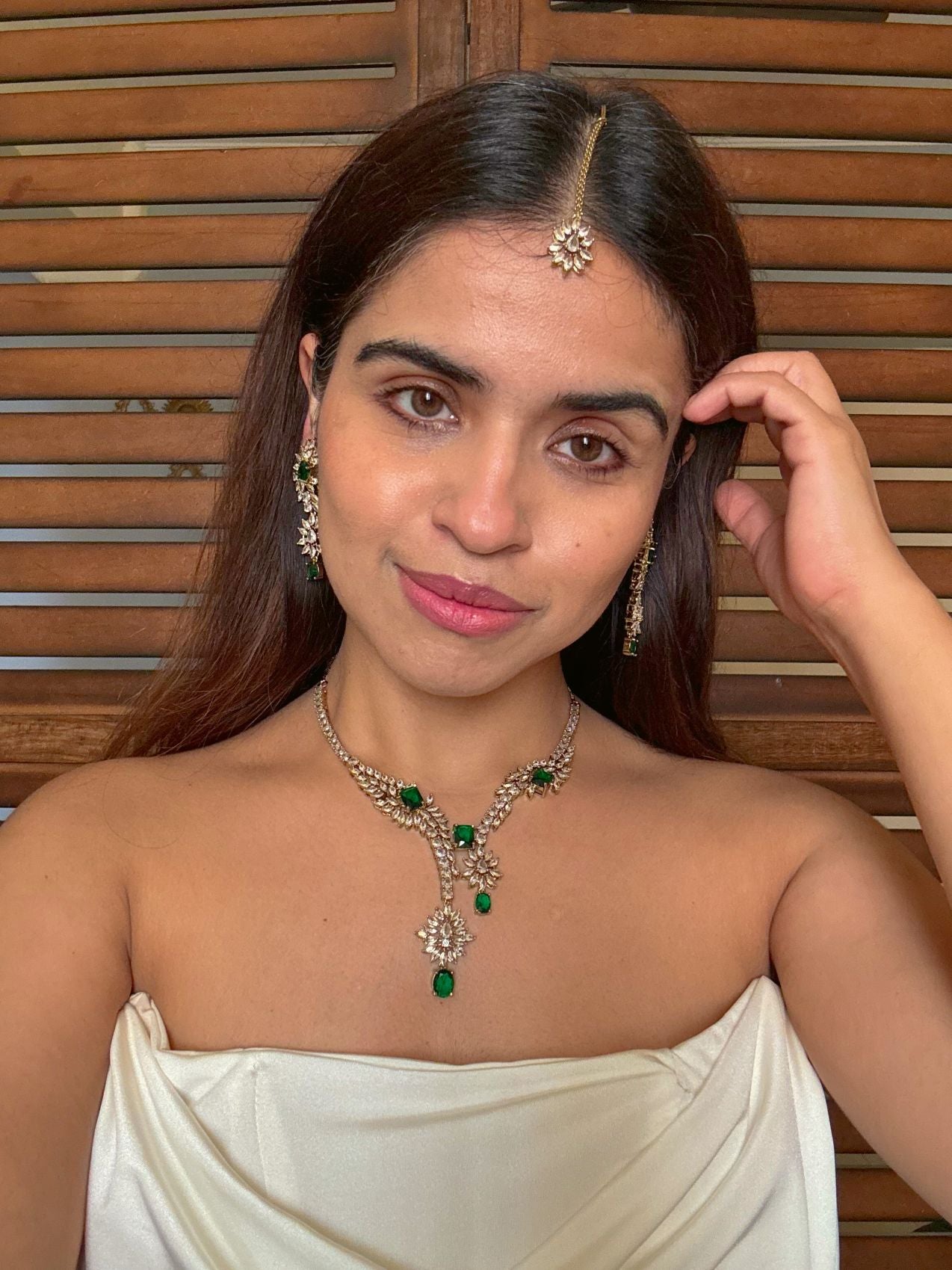 Buy Aarini Green AD Heavy Necklace With Maang Tikka online in India. Shop from an exclusive range of CZ jewellery, gold plated, silver plated jewellery. -full